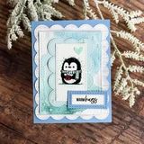 Scalloped seafoam card. Warm hugs banner under the penguin hug.