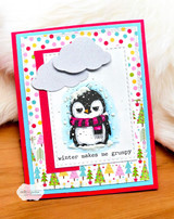 Card with the grumpy penguin in a scarf and a snow cloud, "winter makes me grumpy," on dot paper