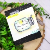 Card of the firefly jar with 'Shine Bright.'
