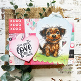 Odie, a scruffy rescue puppy hand-stamped on a card and lettered "It's never too late to find out where you truly belong."