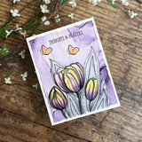 Purple watercolor card of tulips with "thoughts & prayers."