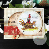 Layered card with a colored frazzled rooster sitting down and the snarky "Oh shit!" sentiment on a circle panel