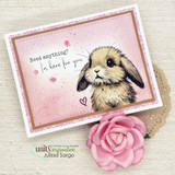 Luna, a gentle lop-eared bunny stamped in red rubber and colored on a handmade card reading "Need anything?."