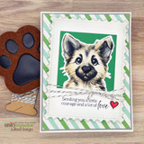 Green striped card of JaKob in a square frame with the courage sentiment and paw cookie nearby.