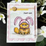 Card with the grumpy cat in pink bunny ears colored orange, captioned 'Fluff off.'