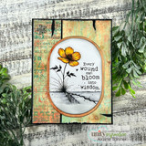 Handmade card with a single delicate poppy blooming up through a crack in the ground, sentiment 'Hope takes root in the hardest places' from the In the Light line.