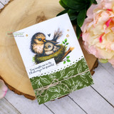 Card with the mama bird and baby bird cuddled in their nest above a leafy green panel, finished with 'You taught me to fly. I'll always be grateful.'
