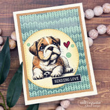 The bulldog puppy in a teal chevron oval on a woodgrain card — 'sending love.'