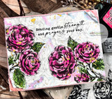 Textured white card with three magenta camellias and deep green leaves, sentiment 'Sending gentle strength and prayers your way.' at the top.