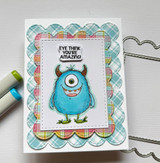 Handmade birthday card with cute cartoon monsters colored in bright teal, purple and green, googly eyes and little horns, sentiment 'Eye think you're amazing!'.
