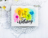 Card with a balloon-dog and party balloons over a rainbow watercolor wash and a bold 'Happy birthday.'