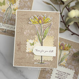 Card with the text background, a yellow daisy and the tag 'here for you both.'