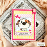 Pink card of the puppy in a stitched frame with hearts and the comfort sentiment.