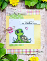 Plaid card with a cute big-eyed turtle in flowers, 'You've got this... one little step at a time!'