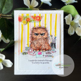 Card showing a ginger-orange version of the cranky craft cat against yellow stripes with 'I made this instead of therapy. You better be grateful.'