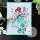 Colorful card of the fairy in a teal-green gown among sparkles and dragonflies.