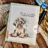 Layered card with the grey Great Dane puppy on a stitched panel over soft green patterned paper, 'Big hugs' sentiment in script.
