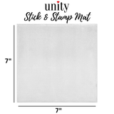 The Unity Stick and Stamp Mat shown flat, a 7 inch square white grid textured mat with the measurement marked on both edges.
