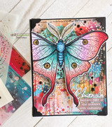 The moth in vivid rainbow watercolor on a splashy mixed-media card — 'Change.'