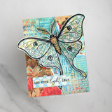 The luna moth on a bright collage card over turquoise and coral paper — 'Let your light lead.'