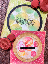 Two cards showing the stamped circle patterns in green and pink with 'oh hey, hi, hello!'
