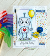 Card with a blue robot holding a balloon on a sprinkle panel, 'bleep bloop bleep... it's your birthday!'