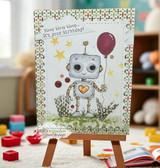 Card with the robot and balloon on an easel over a playful panel, 'it's your birthday!'
