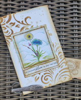 Card with the wildflowers colored blue over a golden damask panel and 'Let yourself bloom in your own time.'