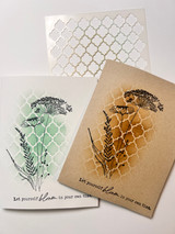 Two kraft cards with the wildflowers stamped through a lattice stencil and 'Let yourself bloom in your own time.'