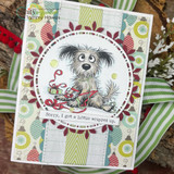 Green Christmas card with the tangled-up pup in a circle, 'Sorry, I got a little wrapped up.'