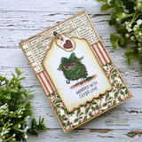 Vintage tag card with a green scruffy bird and 'Wrapped with extra love.'