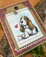 Card of the basset hound with a red heart and 'Just a little love for no reason at all.'