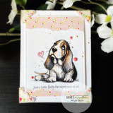 Card of the basset hound with 'Just a little love for no reason at all.'