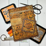 Jack-o'-lantern pumpkin background inked in warm sepia on layered cards with 'HAVE A SPOOKY DAY!'