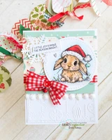 Card with the bunny stamped small on a white circle, ringed with red gingham ribbon and a bow over mint and holiday papers, sentiment "LITTLE JOYS MAKE THE SEASON BRIGHT."