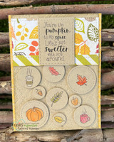 Kraft card with a grid of small circles holding individually stamped leaves, a pumpkin and a coffee mug, under the sentiment 'You're the pumpkin to my spice. Life's just sweeter with you around.'