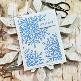 Card of blue snowflakes stamped in a cluster with a 'LET IT SNOW' tag.