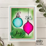 Card with the ornaments colored bright aqua and magenta on a green sponged background, with 'Joy' on a green stitched oval.
