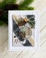 Card with the round ornament filled with patterned papers over plaid and lace strips with a button and twine, and 'Noel', on an embossed white panel.