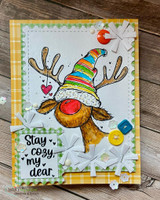 Card with the reindeer in a striped cap over yellow plaid and 'Stay cozy, my dear.'