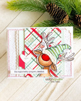 Card with the reindeer in a green cap over plaid papers and 'You make every season sweeter.'