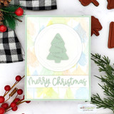 Pastel watercolor tree background with a sage pine dotted with stencil lights inside a stitched circle, and a sage Merry Christmas die-cut below.