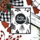 Black and white Christmas card stamped with black pine trees and dotted garlands, with a black circle holding a white Merry Christmas die-cut, beside buffalo check ribbon.