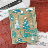 Kraft and teal Christmas card with teal stamped pines trimmed with white dotted lights and stars, in layered teal frames with a teal Merry Christmas die-cut.