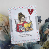 Card with the reading woman in a red top over polka-dot papers and 'Relax, read, repeat...it's your special day.'