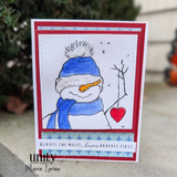 Snowman in a blue hat and scarf on a red-matted card holding a heart.