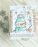 Snowman in a teal scarf on a soft plaid card with silver snowflakes.