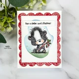 Card with the fuzzy skunk holding a candy cane and 'Have a stinkin' sweet Christmas'.