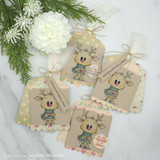 Kraft tags with the reindeer and Christmas sentiments.