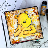 Bear over a golden honeycomb background stained with amber distress ink, captioned "You are braver than you think. And loved more than you know."